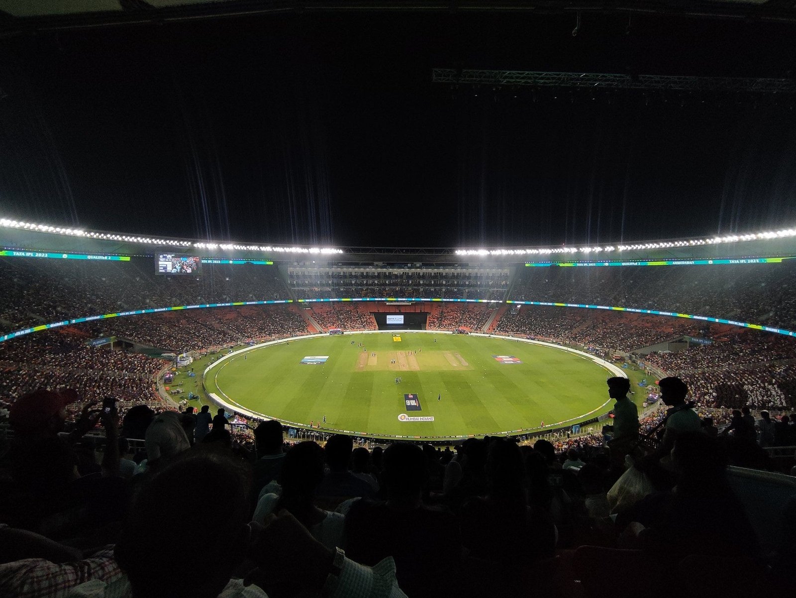 FairPlay Login - Floodlit cricket stadium during a live match